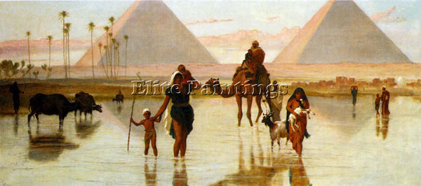 FREDERICK GOODALL ARABS CROSSING A FLOODED FIELD BY THE PYRAMIDS ARTIST PAINTING